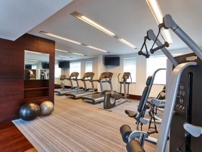 Photo of exercise equipment in a hotel gym.