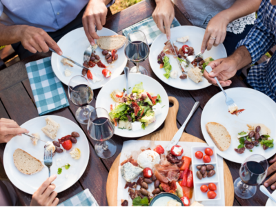 Friends eating a meal together.